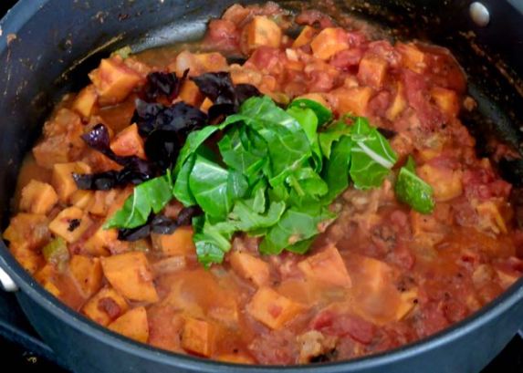 kitchen adding chard for the West African stew jan 20 - 1